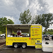 Servers from Adele's Excelsior Minnesota frozen custard shop are standing by ready to hand out custard.